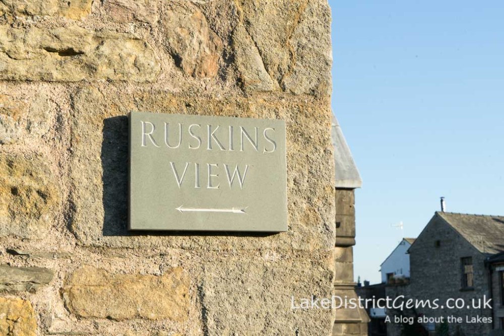 Ruskin's View sign on church
